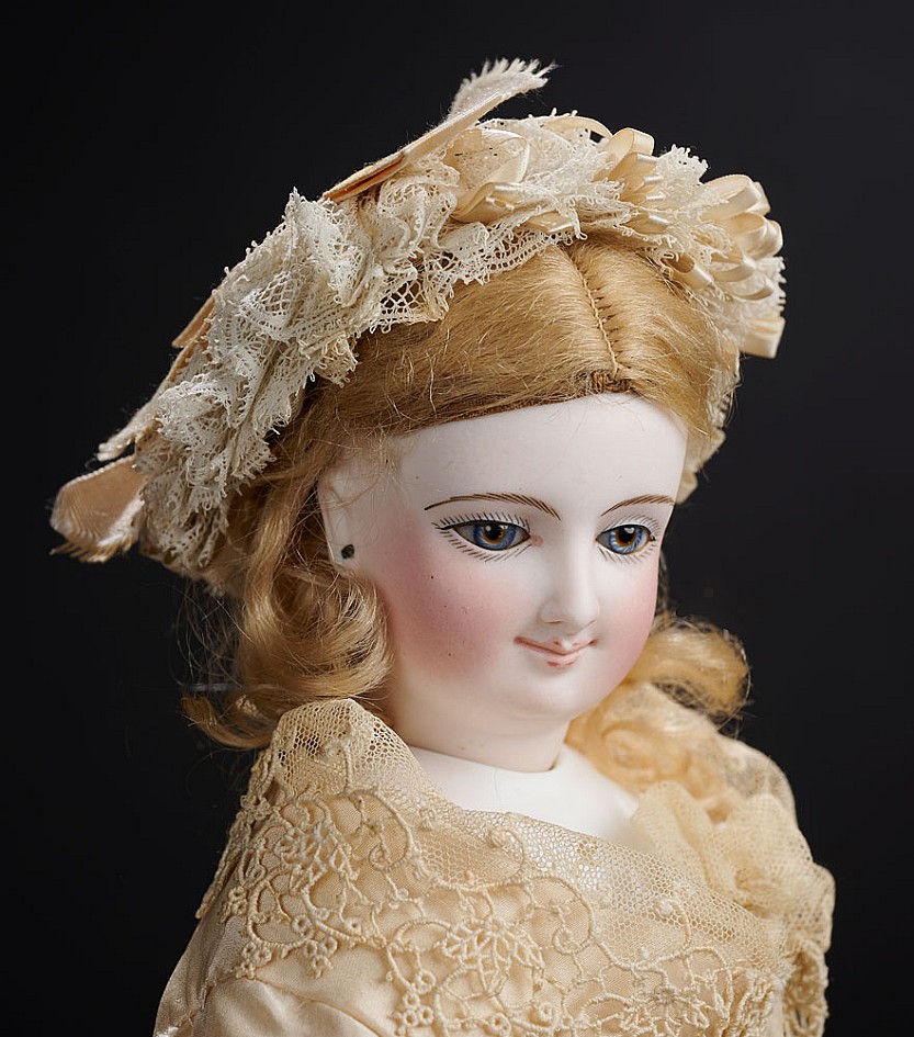 French Bisque Smiling Poupee with Articulated Wooden Body by Leon
