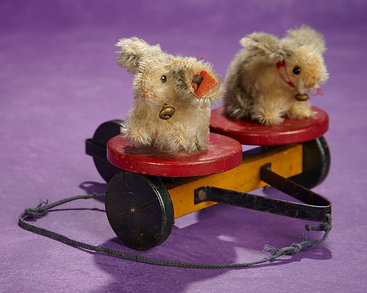 German Pull-Toy Mohair Bunnies on Eccentric Wheel Base by Steiff